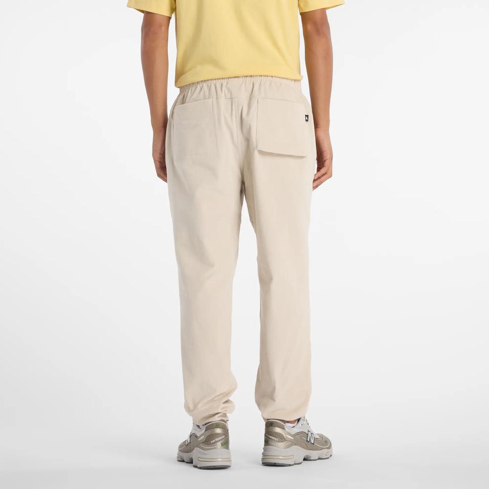 Pánske nohavice New Balance MP53521TWF - béžové