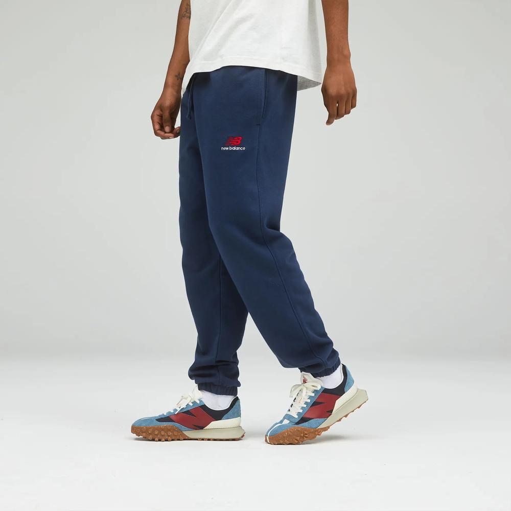 Nohavice unisex New Balance UP21500NGO – tmavomodrá