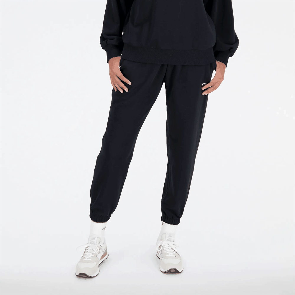 Nohavice New Balance WP33508BK – čierne
