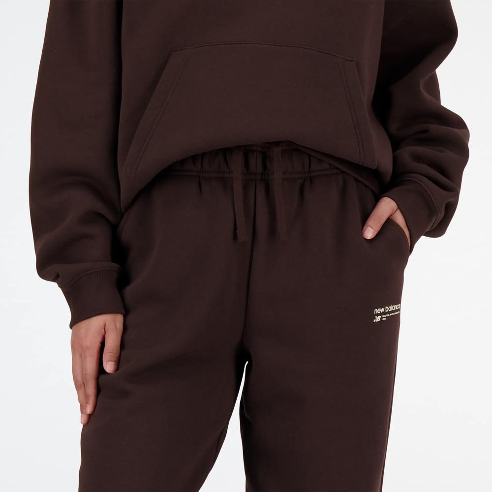 Nohavice New Balance WP33513JIR - hnedé