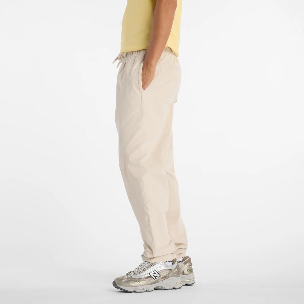 Pánske nohavice New Balance MP53521TWF - béžové