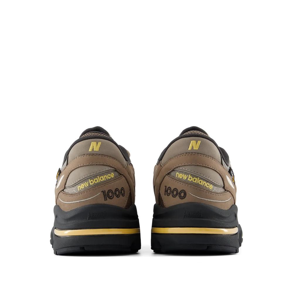 Unisex topánky New Balance U100079S - hnedé