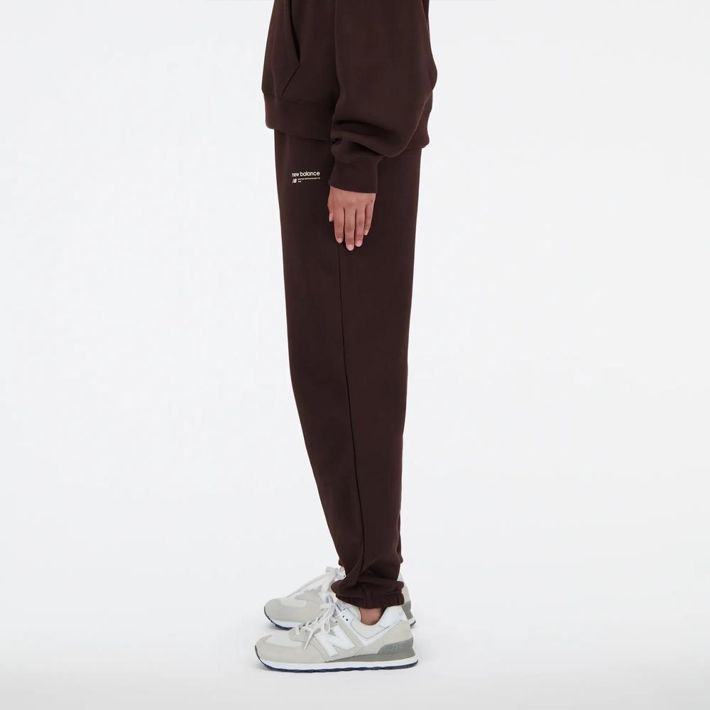 Nohavice New Balance WP33513JIR - hnedé
