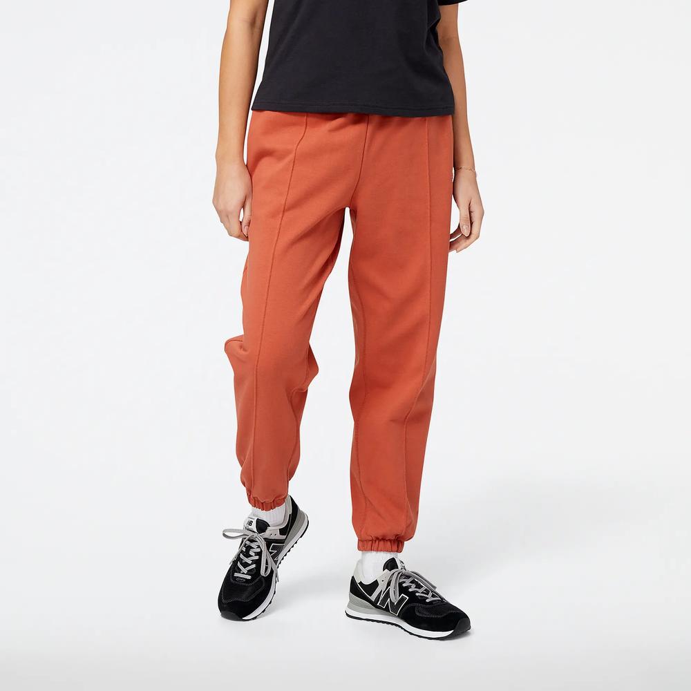 Nohavice New Balance WP23553MHY - hnedé