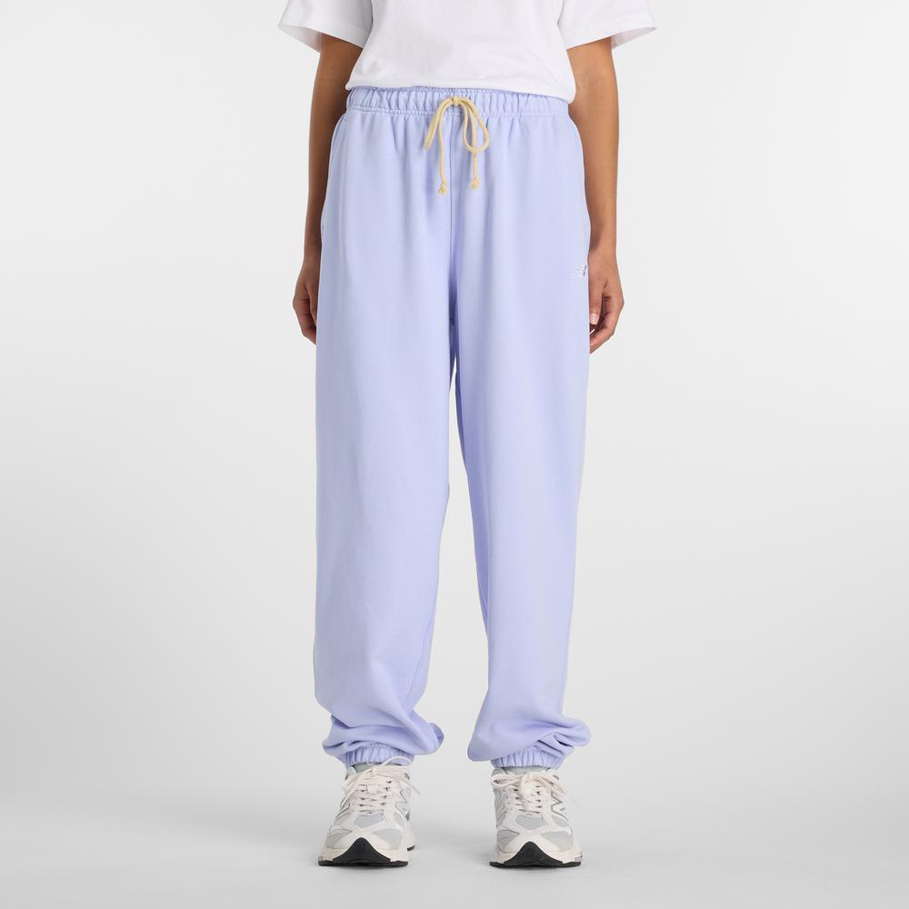 Dámske nohavice New Balance WP41513DYK - fialové