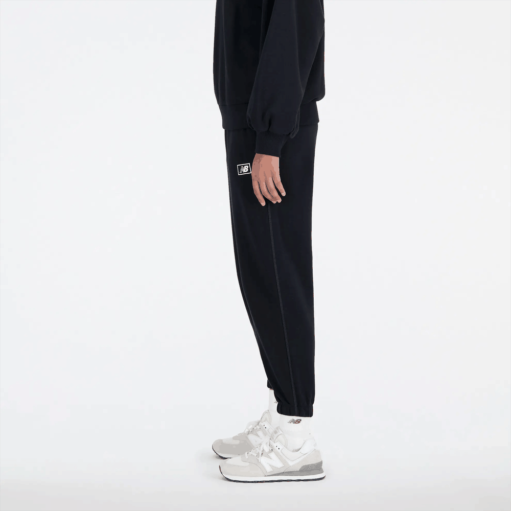 Nohavice New Balance WP33508BK – čierne