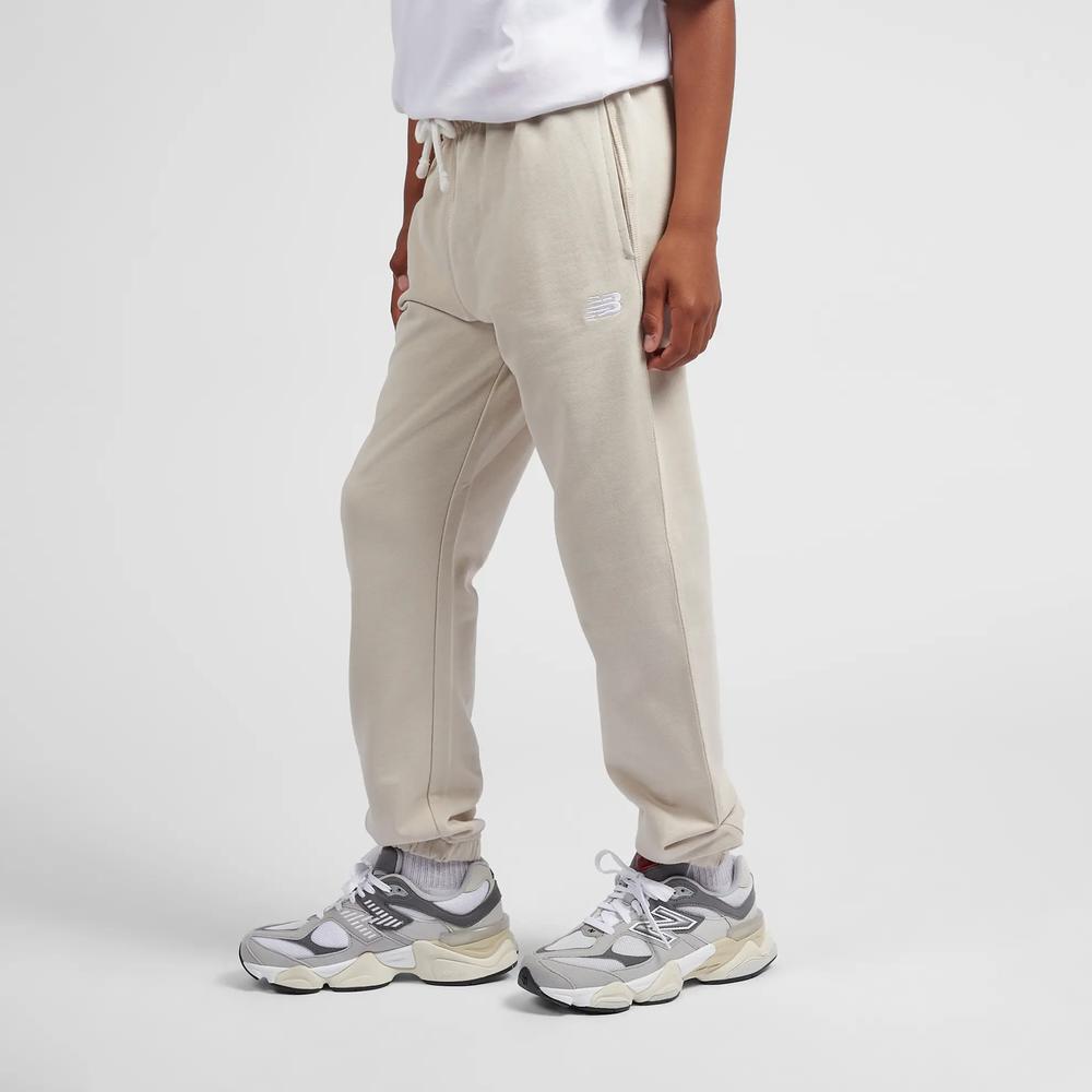 Detské nohavice New Balance LAKB0060TWF - béžové