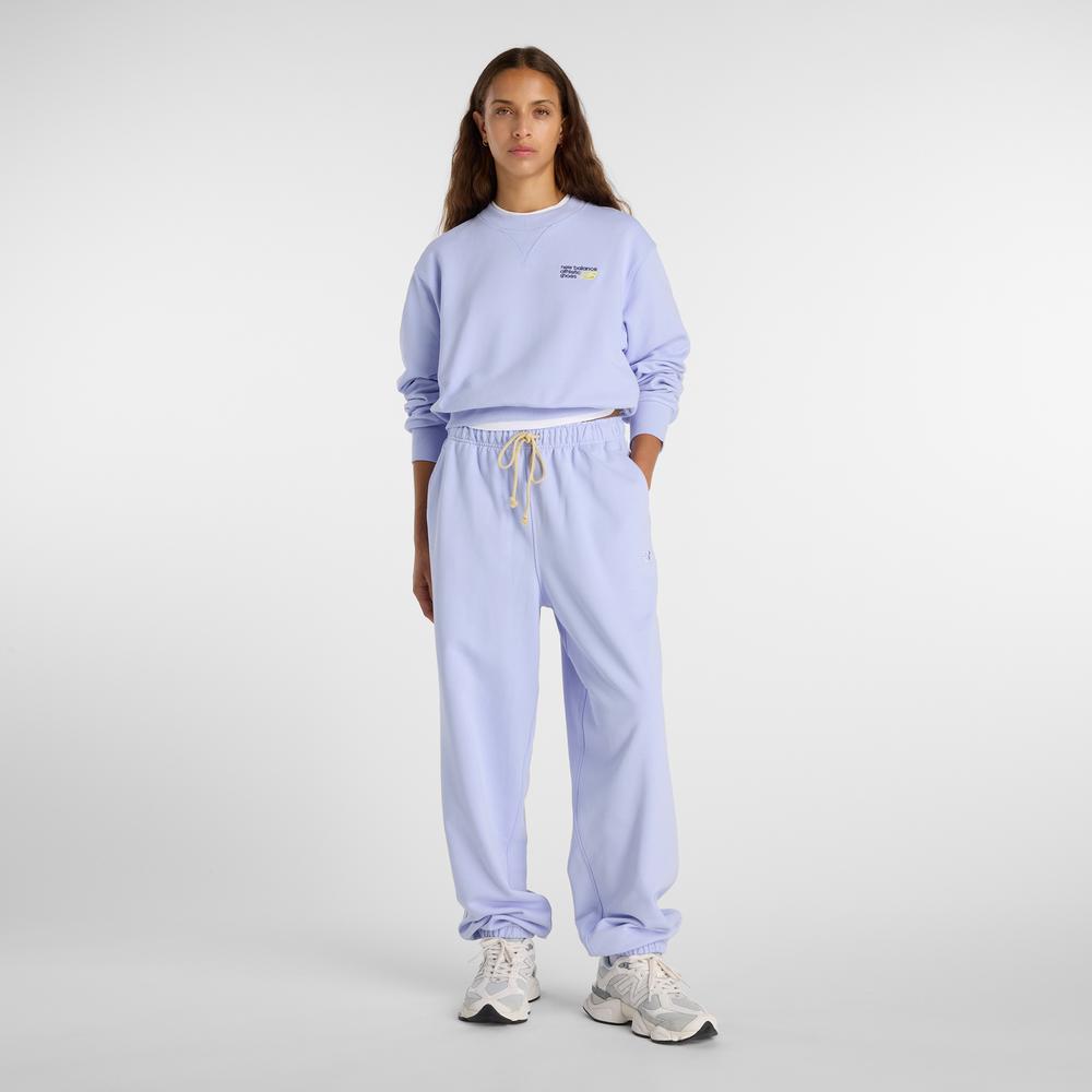 Dámske nohavice New Balance WP41513DYK - fialové