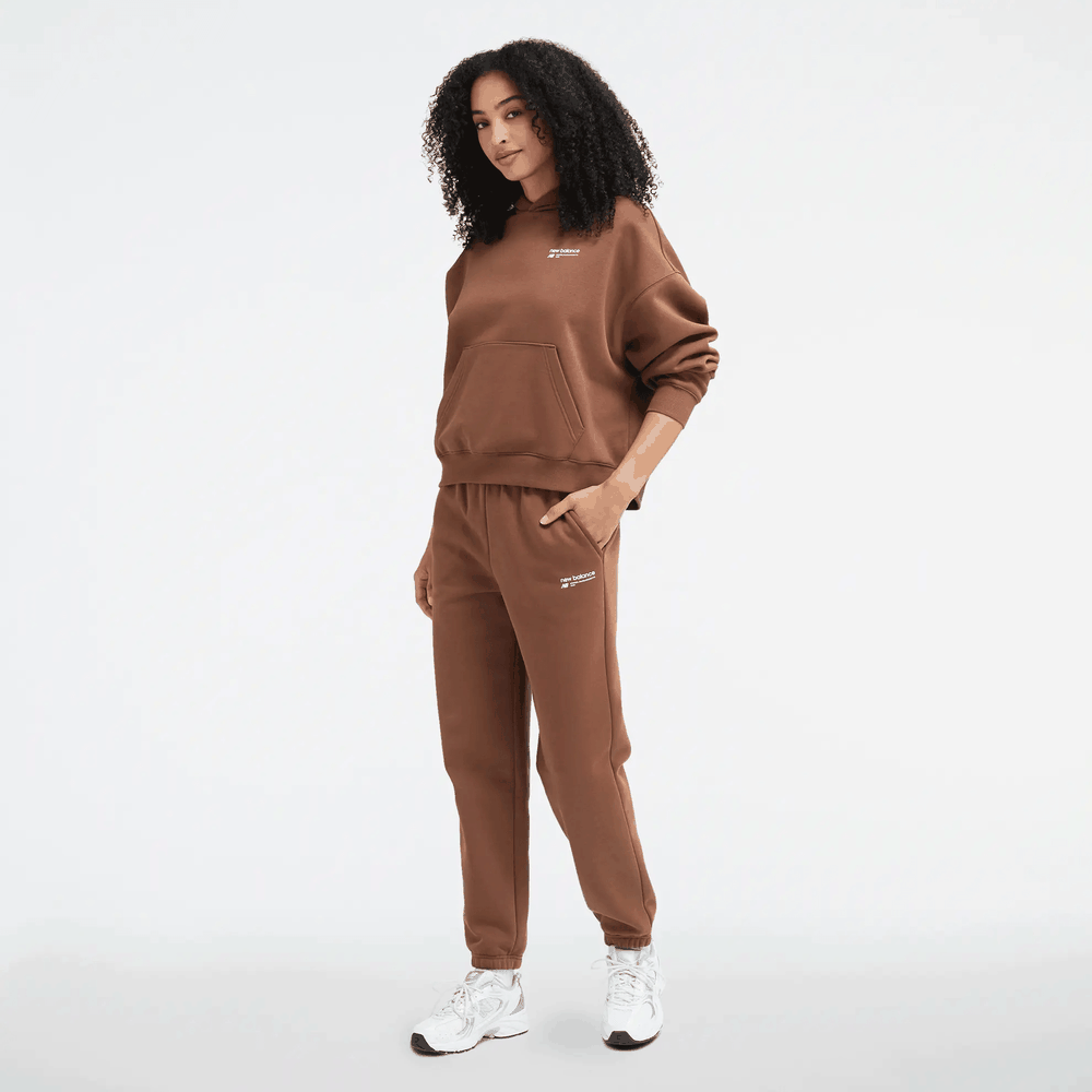 Nohavice New Balance WP33513PNC - hnedé