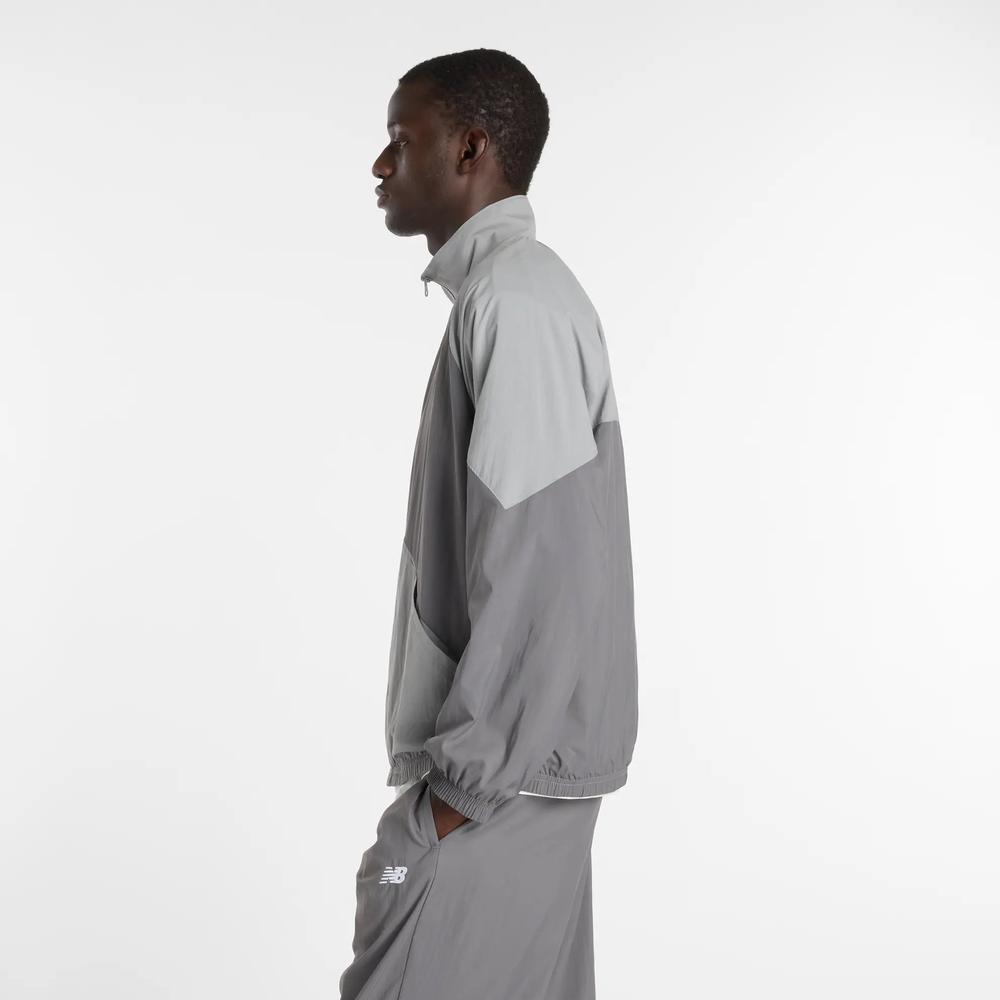 Mužský vetrovka New Balance MJ61J73YCAS - šedý