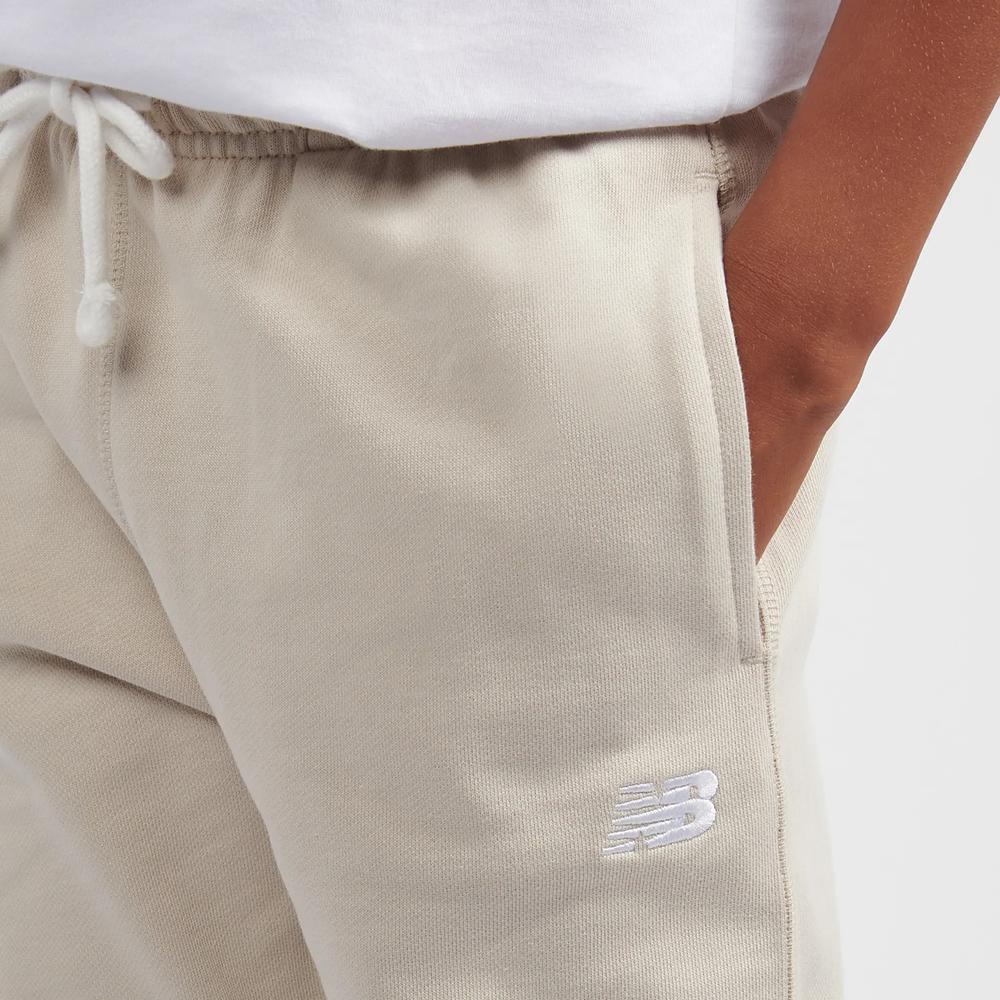 Detské nohavice New Balance LAKB0060TWF - béžové