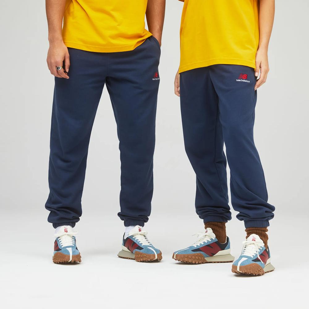 Nohavice unisex New Balance UP21500NGO – tmavomodrá