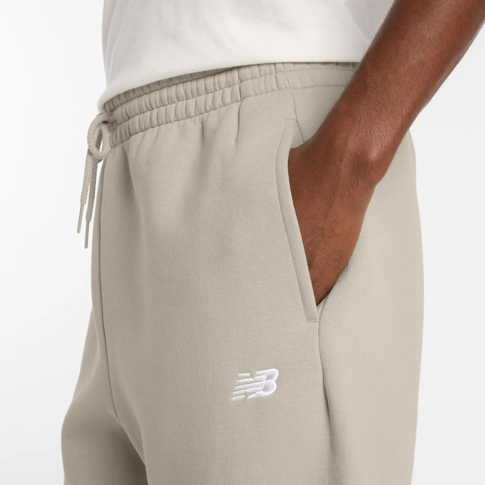 Pánske nohavice New Balance MP41503TWF - béžové