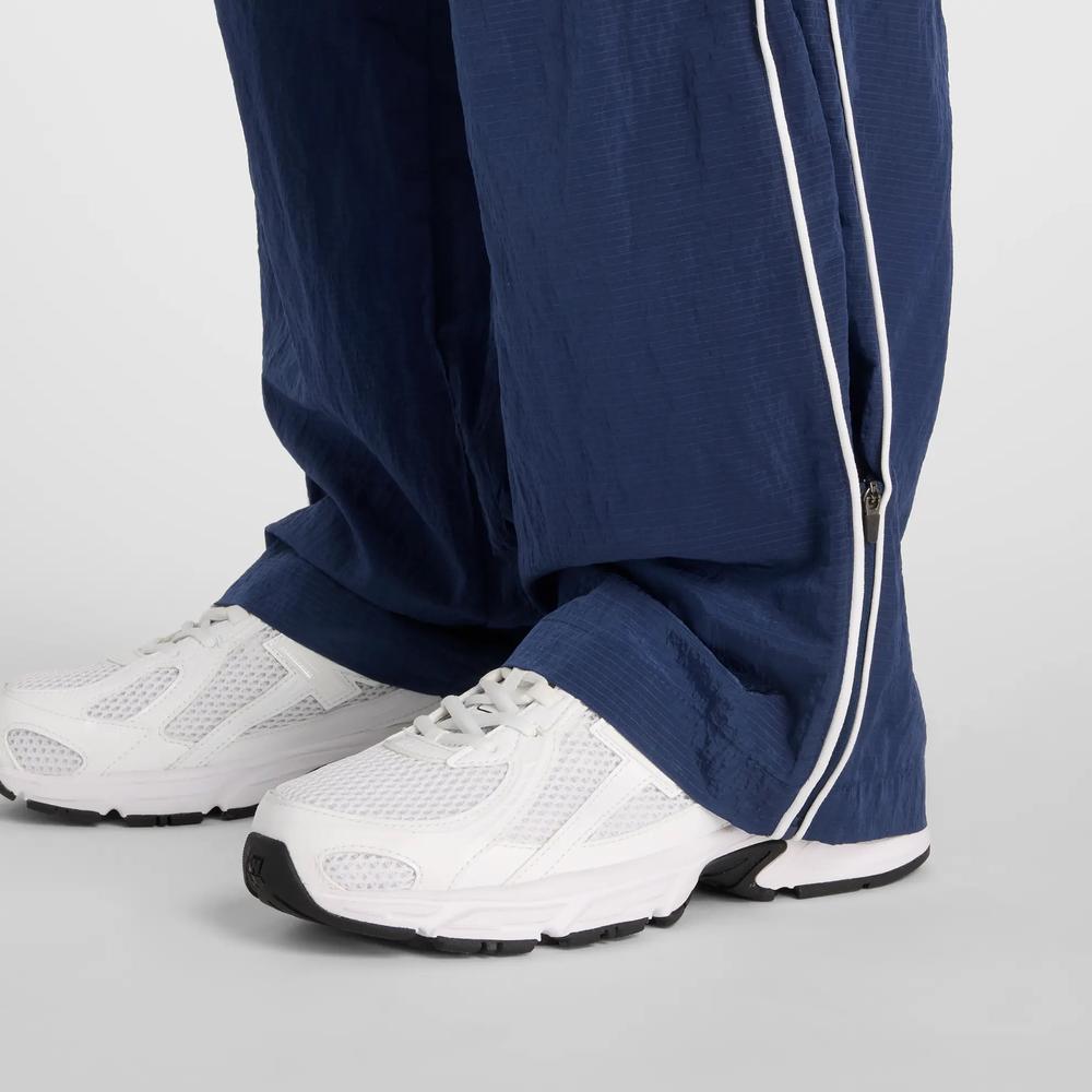 Dámská nohavice New Balance WB61Z1E6NNY - tmavomodré