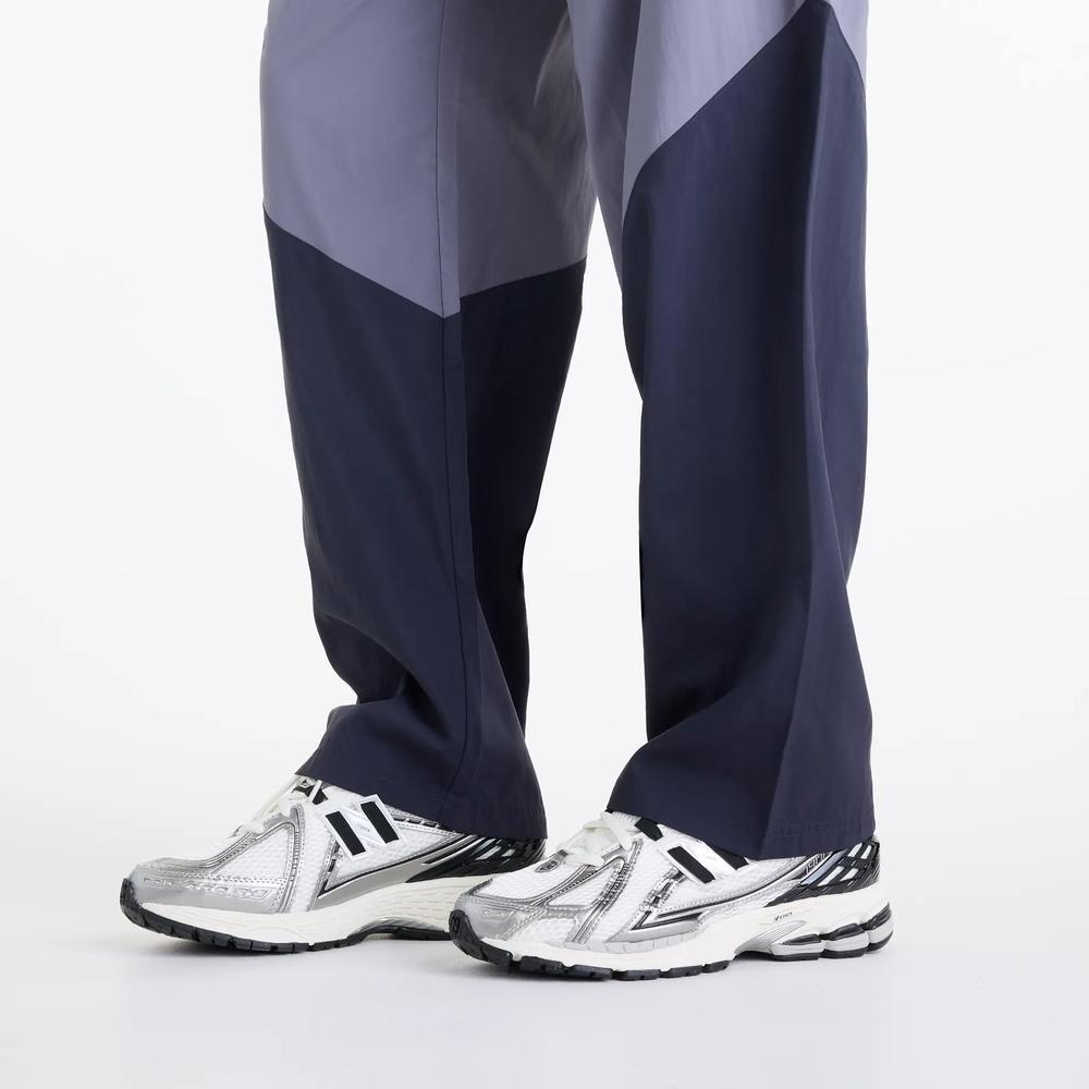 Pánske nohavice New Balance Sport Legacy MB61R010AA9 - fialové