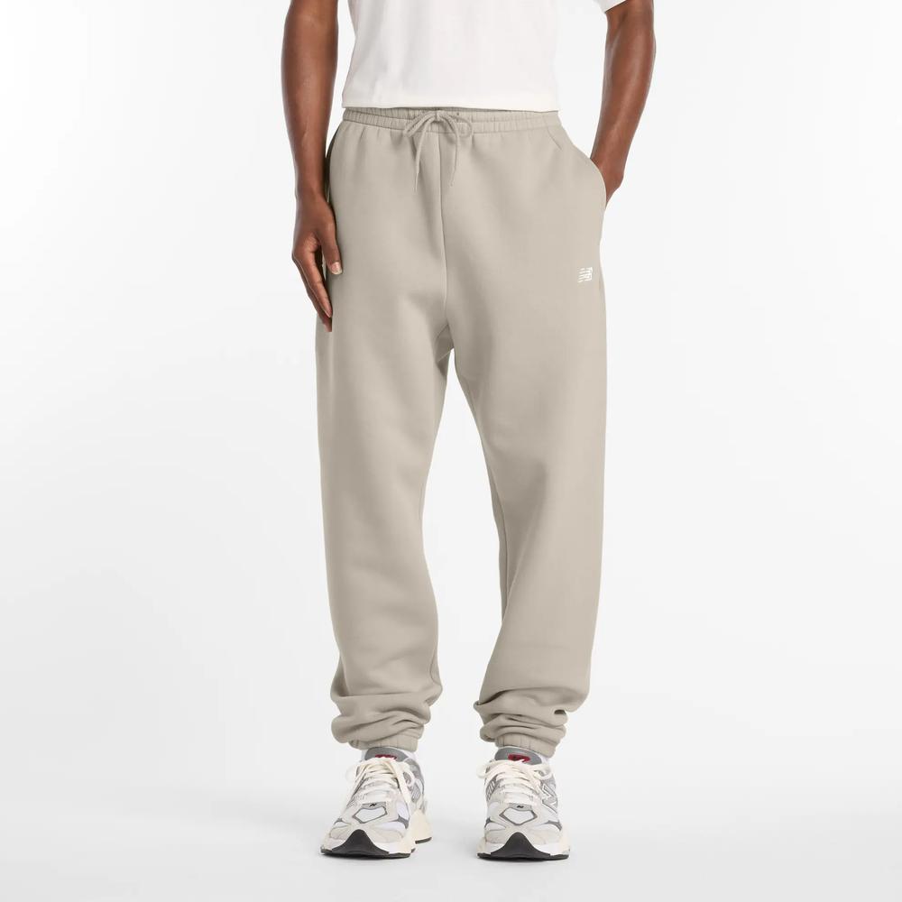 Pánske nohavice New Balance MP41503TWF - béžové