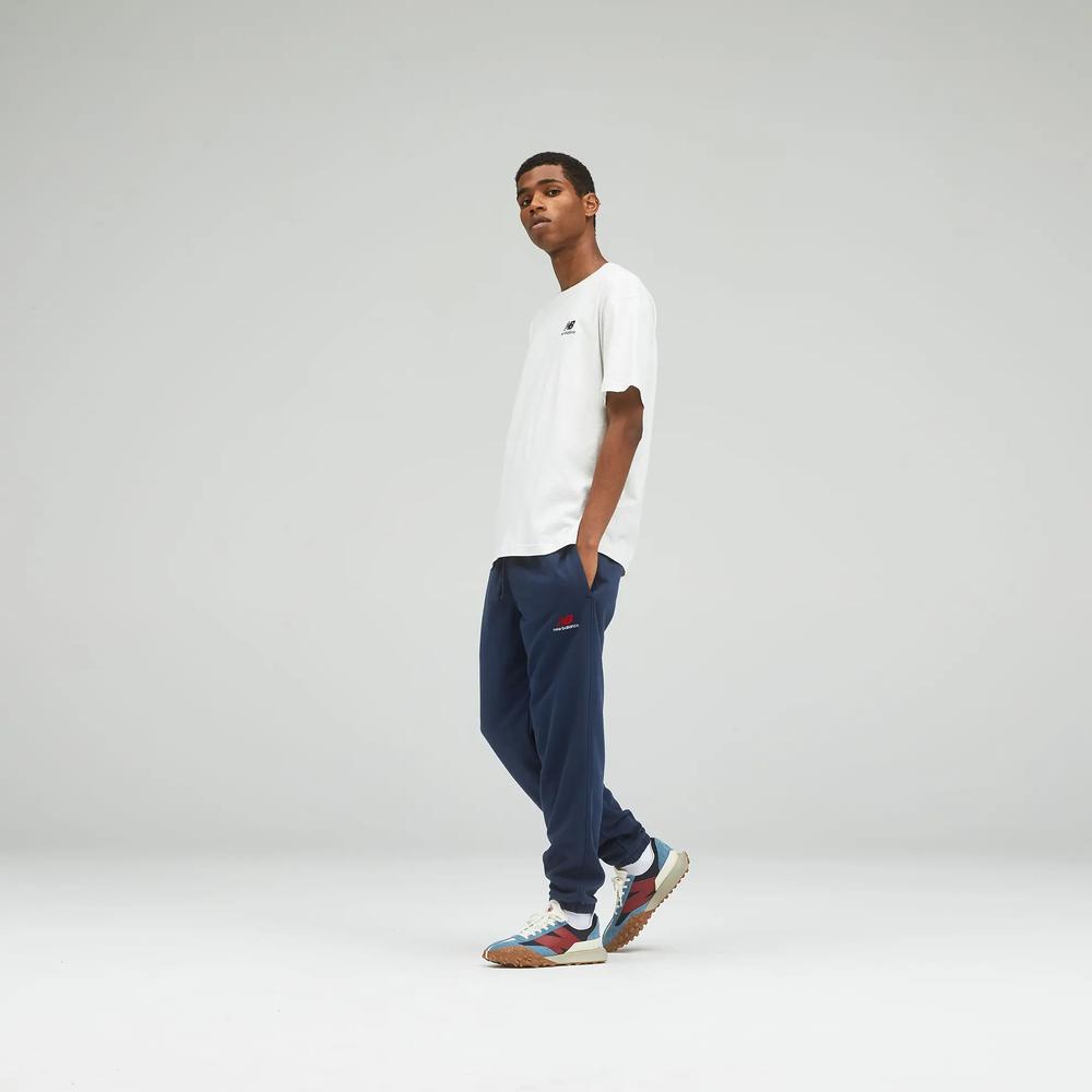 Nohavice unisex New Balance UP21500NGO – tmavomodrá