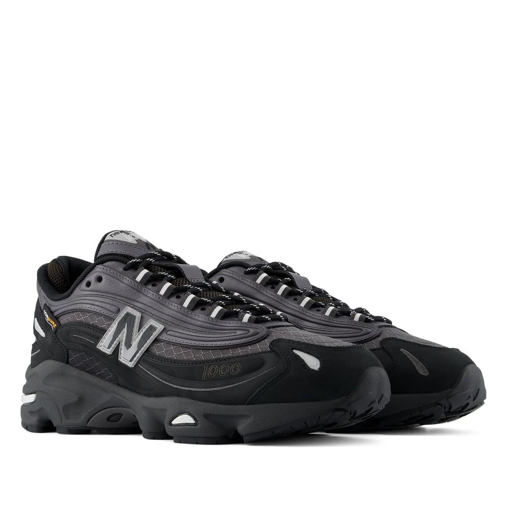 Unisex topánky New Balance U100095J - čierne