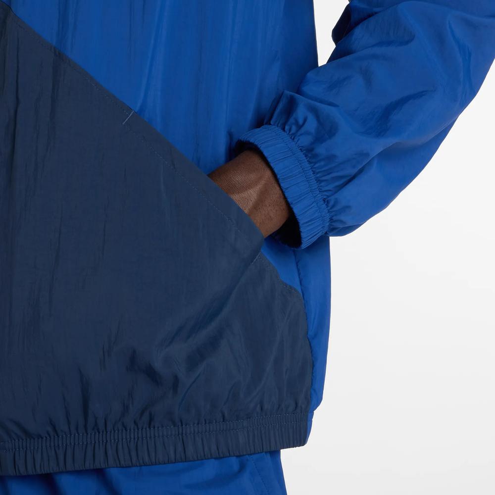 Mužský vetrovka New Balance MJ61J73YNNY - tmavomodré