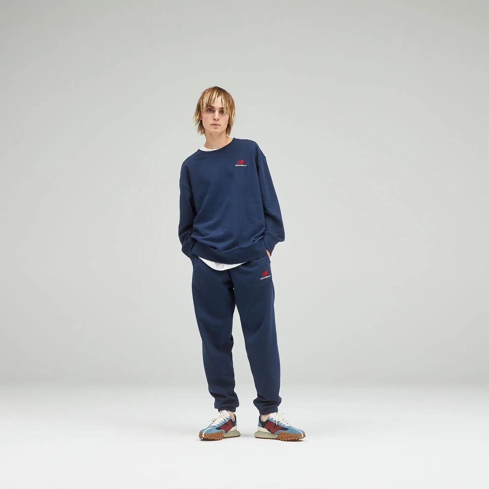 Nohavice unisex New Balance UP21500NGO – tmavomodrá