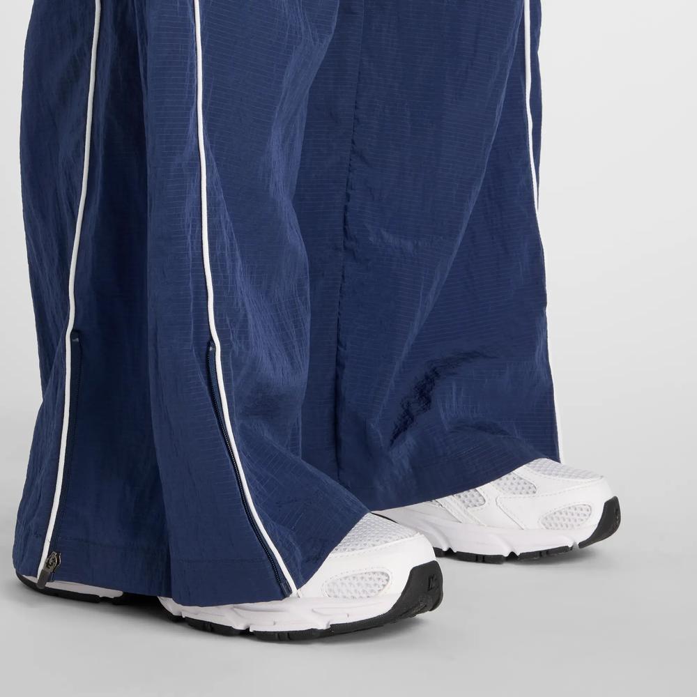 Dámská nohavice New Balance WB61Z1E6NNY - tmavomodré