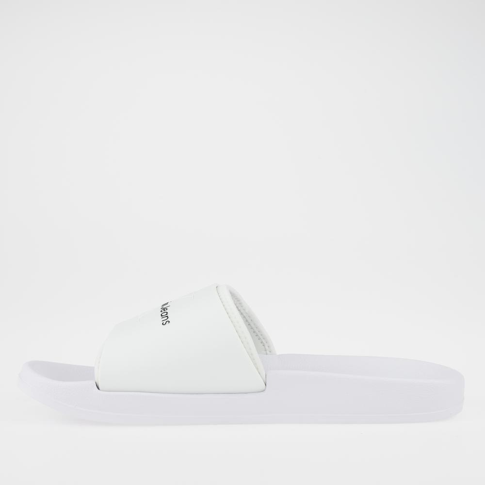 Klapky Calvin Klein Slide Monogram TPU YM0YM00361-YBR - biele
