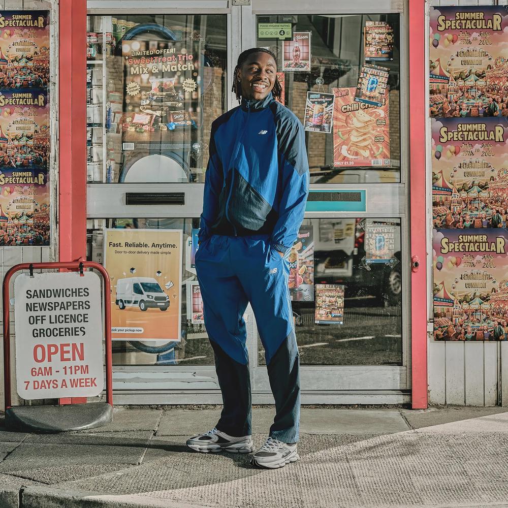 Mužský vetrovka New Balance MJ61J73YNNY - tmavomodré