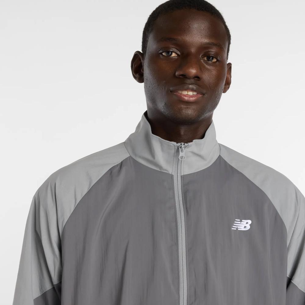 Mužský vetrovka New Balance MJ61J73YCAS - šedý