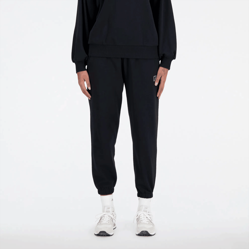 Nohavice New Balance WP33508BK – čierne