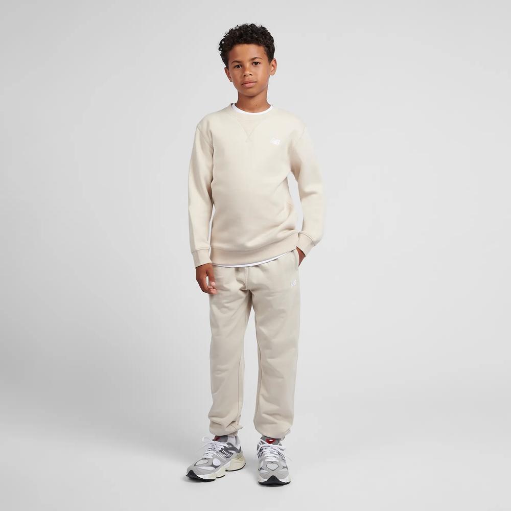 Detské nohavice New Balance LAKB0060TWF - béžové