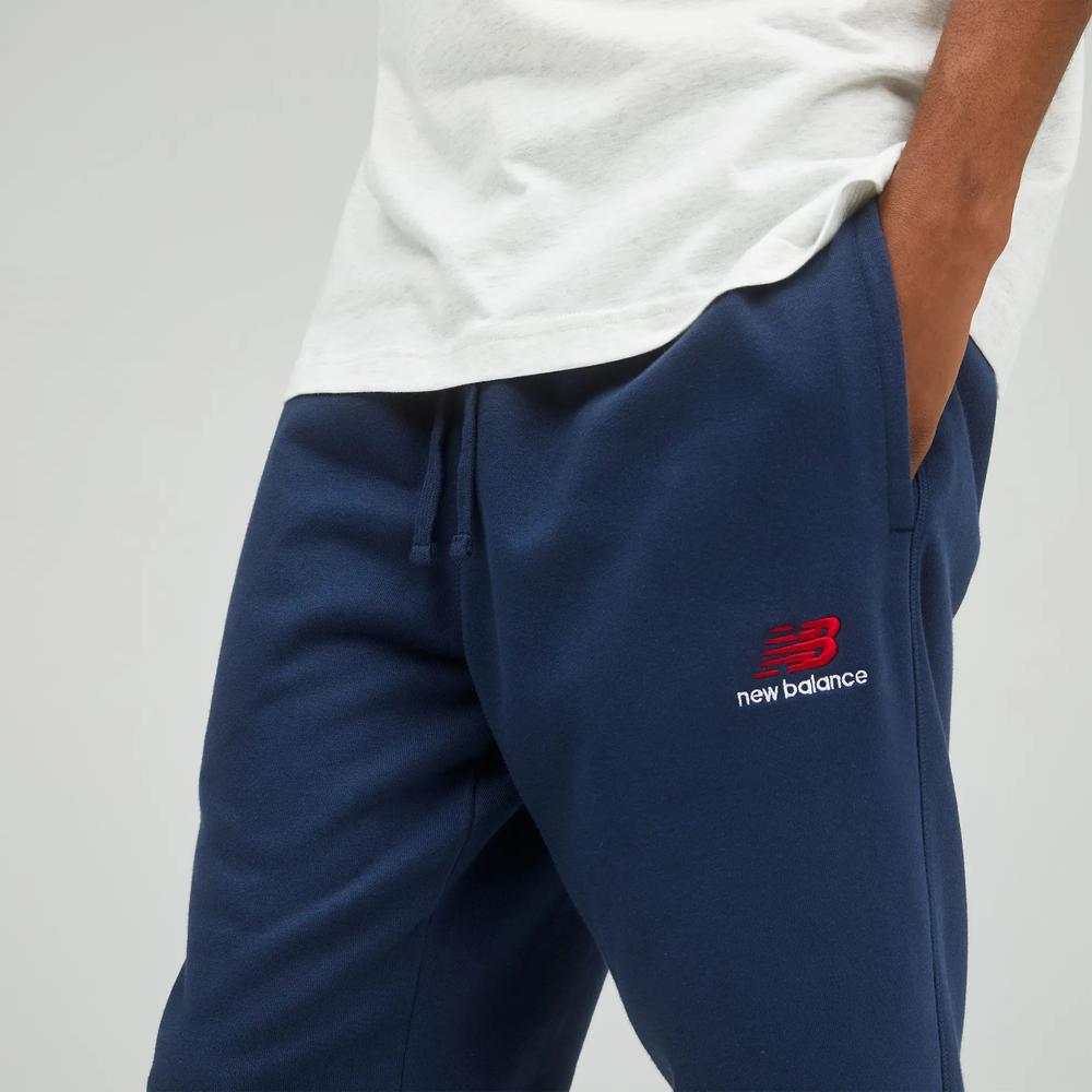 Nohavice unisex New Balance UP21500NGO – tmavomodrá