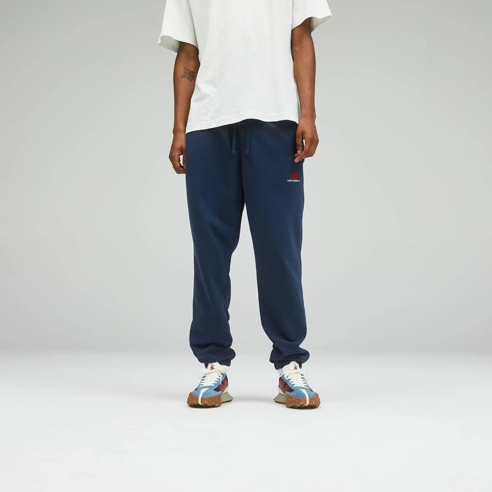 Nohavice unisex New Balance UP21500NGO – tmavomodrá