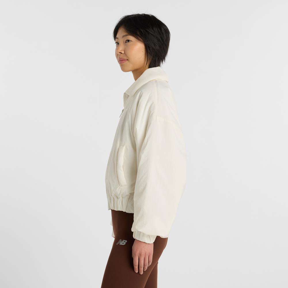 Dámská bunda New Balance WJ61D8YXSST - béžové