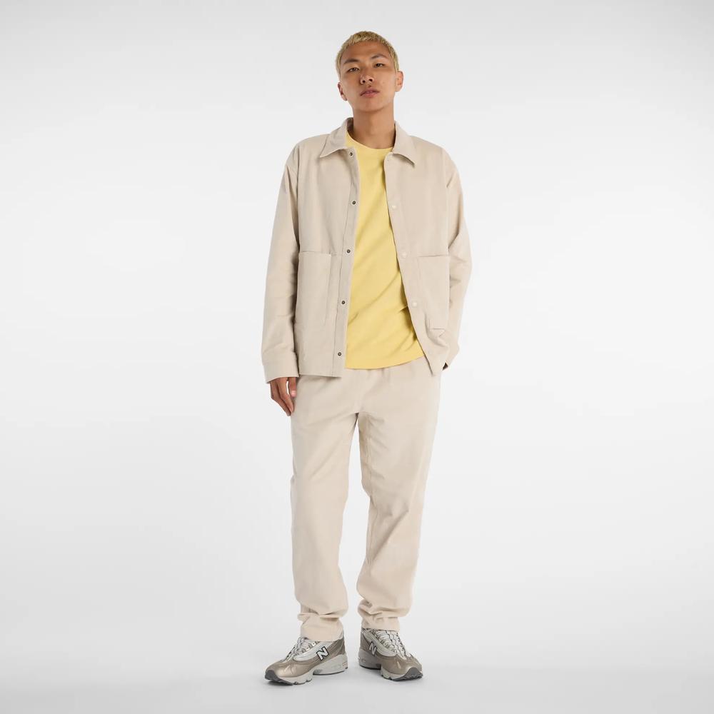 Pánske nohavice New Balance MP53521TWF - béžové