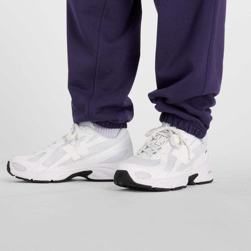 Dámske nohavice New Balance WP41513BOY - fialové