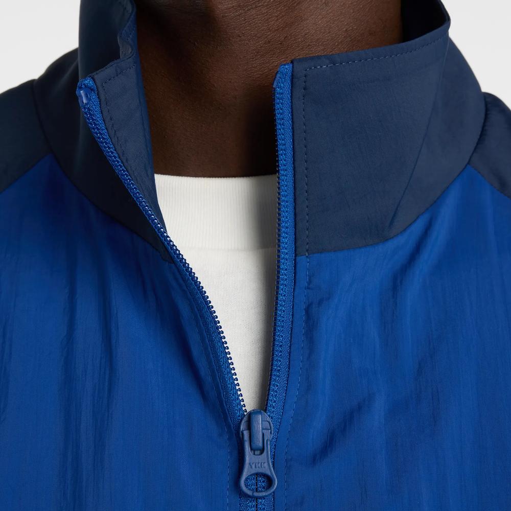 Mužský vetrovka New Balance MJ61J73YNNY - tmavomodré