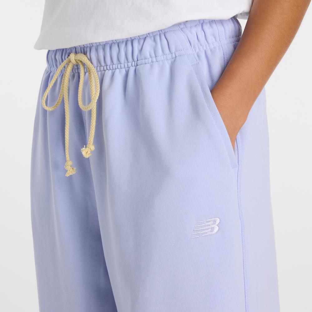 Dámske nohavice New Balance WP41513DYK - fialové