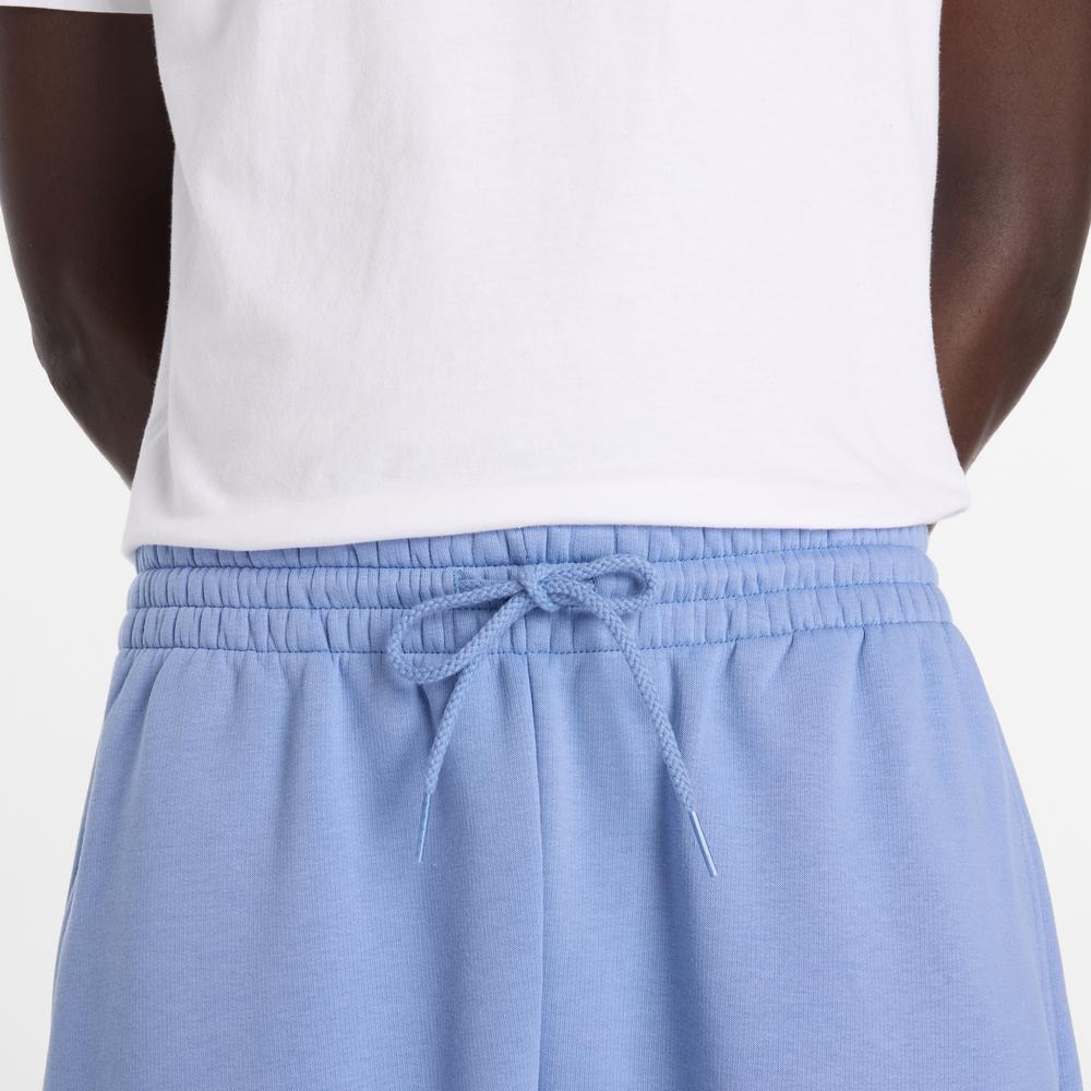 Pánske nohavice New Balance Reimagined Fleece Jogger MB61E74AAA3 - modré