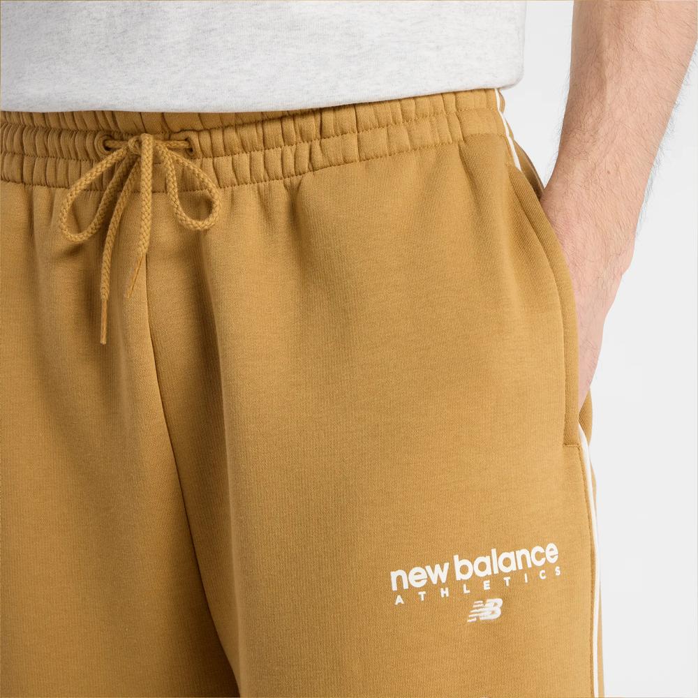 Pánske nohavice New Balance MB61M77EABG - pomarančové